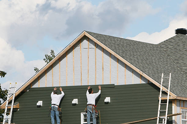 Professional Siding technician working in Fairfax, OH